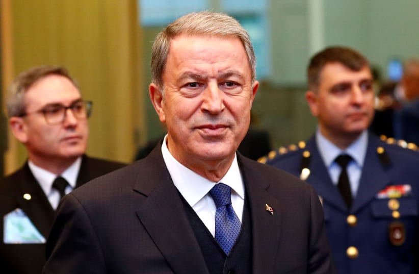 Turkey's Defence Minister Hulusi Akar attends a NATO defence ministers meeting at the Alliance headquarters in Brussels, Belgium February 12, 2020.  (photo credit: REUTERS/FRANCOIS LENOIR)