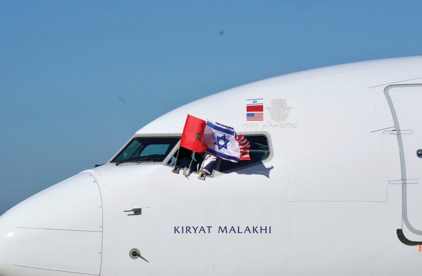 AN EL AL airliner displays the Israeli, Moroccan and US flags last week as it arrives in Rabat. (photo credit: US EMBASSY IN MOROCCO/REUTERS)
