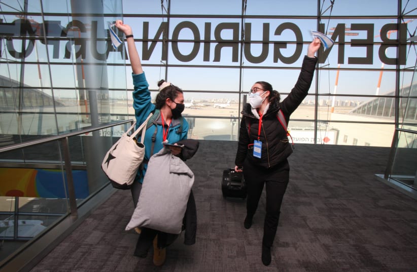 Two Olot Celebrate as they Land on Dec 29, 2020.  (photo credit: YONIT SCHILLER)