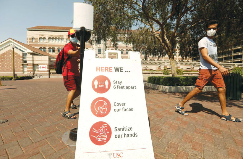 A SIGN ON the campus of the University of Southern California at the beginning of the fall semester (photo credit: GENARO MOLINA/LOS ANGELES TIMES/TNS)