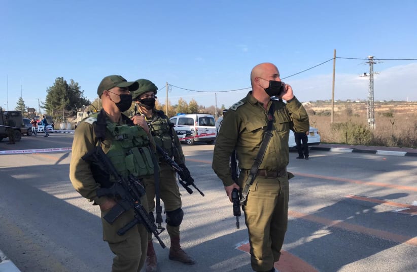 IDF soldiers are seen at the Gush Etzion Junction after thwarting a terrorist attack, on January 5, 2021. (photo credit: IDF SPOKESPERSON'S UNIT)