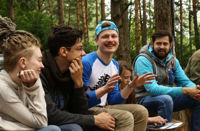 Igor Litvin, right, started a Torah-based ecology club in Minsk, Belarus. Participants meet every so often to discuss an environmental dilemma and what Judaism has to say about it. (Dmitry Zemetkov) (photo credit: DMITRY ZEMETKOV)