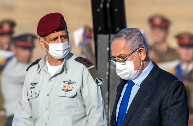 Attending an IAF pilot graduation with Prime Minister Benjamin Netanyahu (photo credit: ARIEL SCHALIT/POOL))
