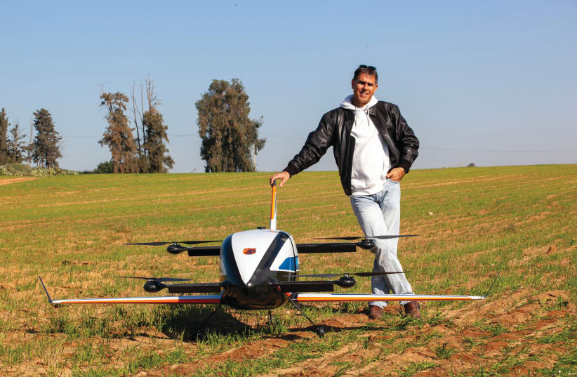 EYAL REGEV with one of Gadfin’s air cargo drones (photo credit: Courtesy)