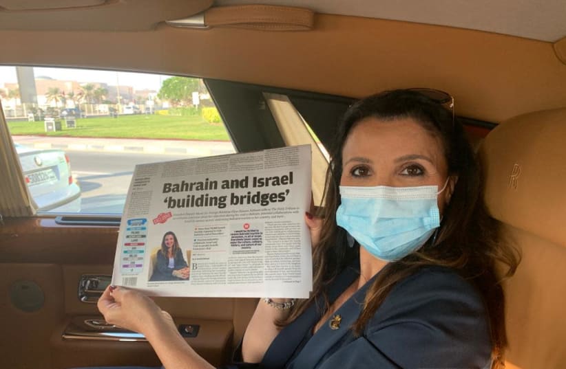  Jerusalem Deputy Mayor Fleur Hassan-Nahoum holds an issue of News of Bahrain, in which she was featured. (photo credit: Courtesy)