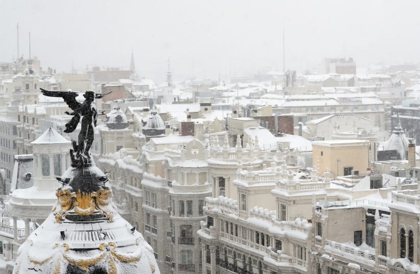 View from the rooftop of the Circulo de Bellas Artes cultural center during a heavy snowfall in Madrid (photo credit: REUTERS/SUSANA VERA)