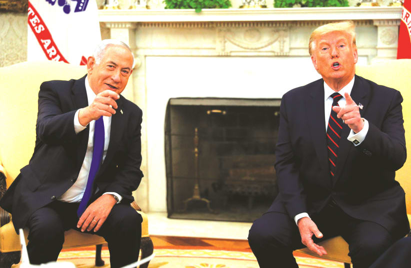 PRIME MINISTER Benjamin Netanyahu meets with President Donald Trump at the White House in Washington, DC, in September. (photo credit: TOM BRENNER/REUTERS)