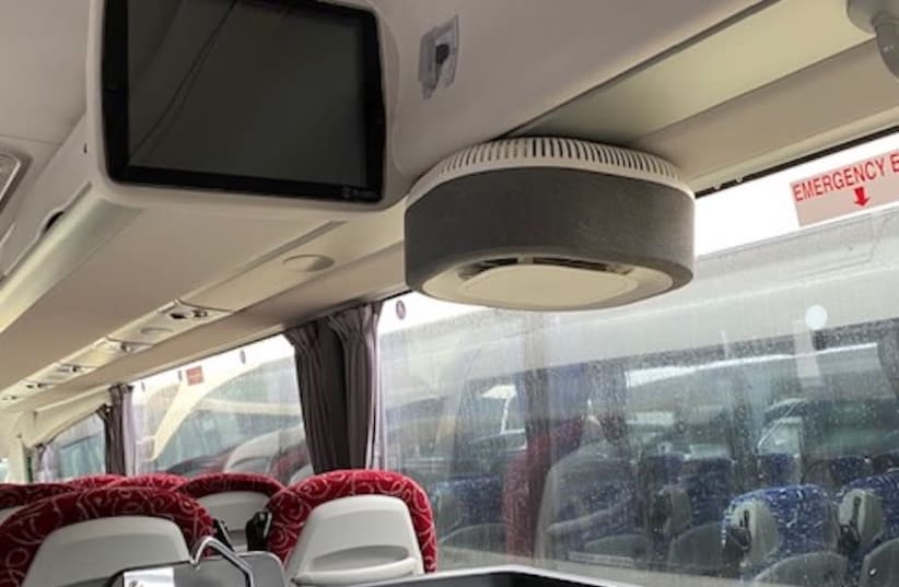 The Aura Air system, shown here installed on a bus, was found to be more than 99.9% effective in disinfecting indoor air and catching particles that can cause sickness.  (photo credit: AURA AIR)