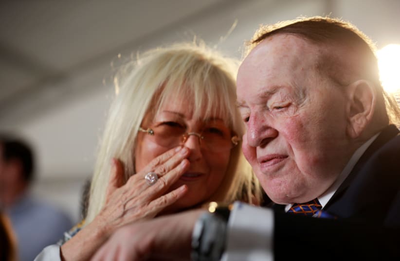 Miriam and Sheldon Adelson attend a cornerstone-laying ceremony for the Health and Medical Sciences School building, named after them, at Ariel University (photo credit: AMIR COHEN/REUTERS)