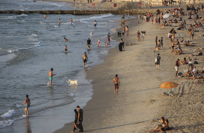 The Tel Aviv beach – before the pandemic. (photo credit: MARC ISRAEL SELLEM)