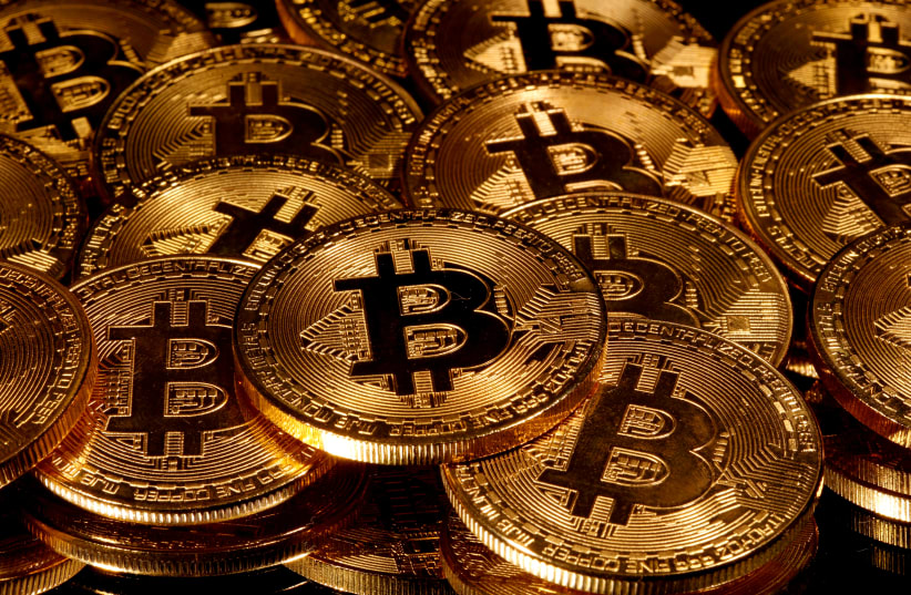 Representations of virtual currency Bitcoin are seen in this picture illustration (photo credit: REUTERS)