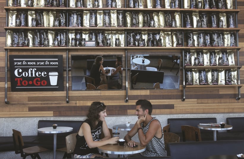 TÊTE-À-TÊTES like this one at a Tel Aviv Port café seem a thing of the distant past (photo credit: MARC ISRAEL SELLEM)