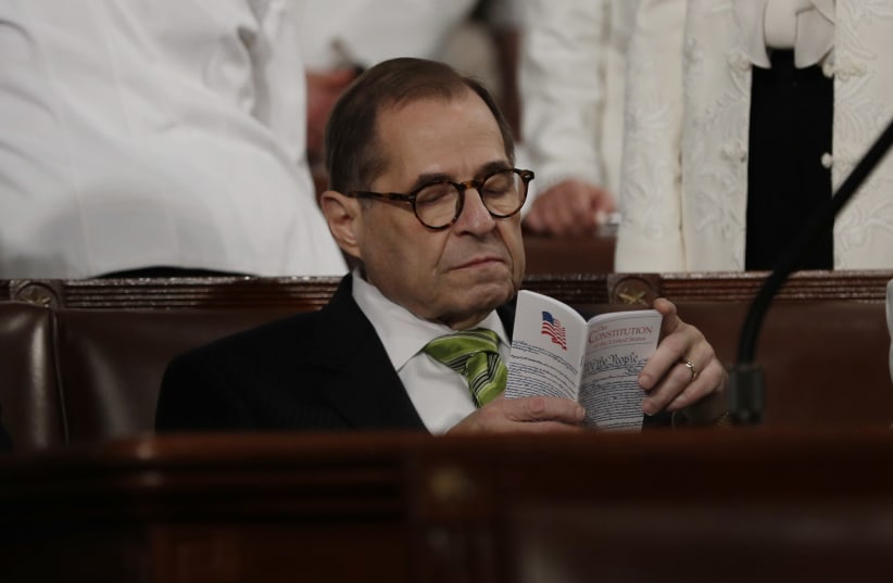 House impeachment manager and Judiciary Committee Chairman Jerry Nadler (D-NY) sits in his seat reading a pocket copy of the US Constitution as he waits for the start of US President Donald Trump's State of the Union address to a joint session of the US Congress in the House Chamber of the US Capito (photo credit: REUTERS/LEAH MILLIS/POOL)