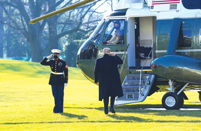 FORMER PRESIDENT Donald Trump boards ‘Marine One’ as he departs Washington to visit the US-Mexico border wall in Texas on January 12. (photo credit: KEVIN LAMARQUE/REUTERS)
