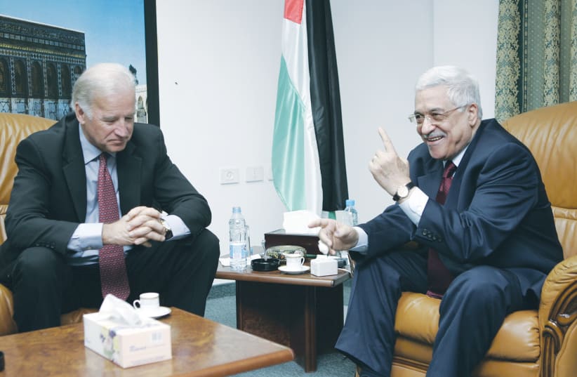 THEN-SENATOR JOE BIDEN talks with Mahmoud Abbas in Ramallah in 2005. (photo credit: DAVID FURST/REUTERS)