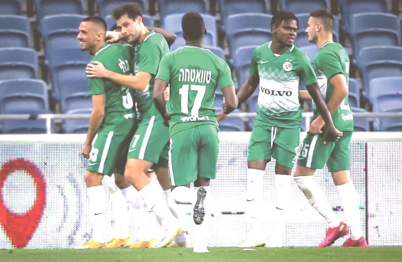 MACCABI HAIFA has four more wins (12) than any other team in the Israel Premier League through 16 games and holds an eight-point lead atop the standings. (photo credit: MAOR ELKASLASI)
