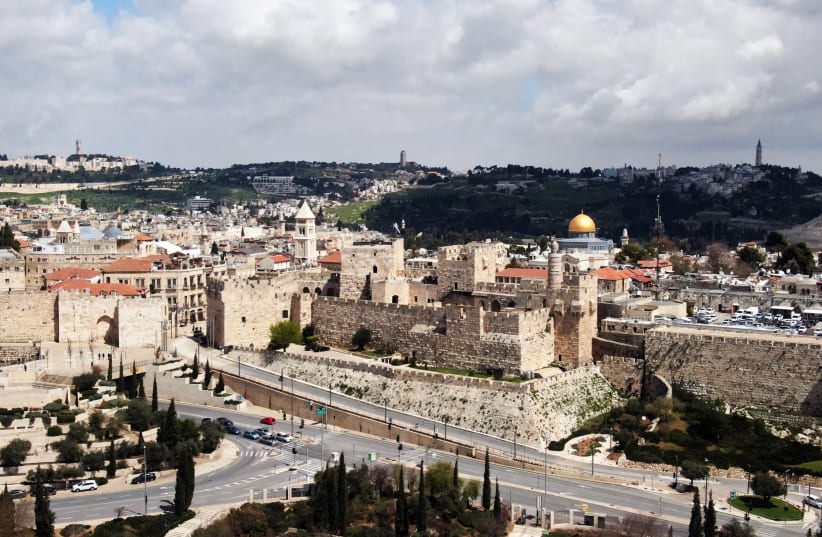 A general view of the Old City and Walls of Jerusalem taken with a drone on March 22, 2020. (photo credit: ILAN ROSENBERG/REUTERS)