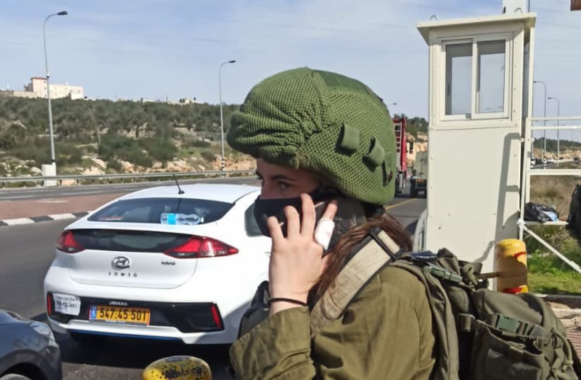 Corporal "L." from the Home Front Command's Search and Rescue Unit following the stabbing attack on Tuesday, January 26, 2021. (photo credit: IDF SPOKESPERSON'S UNIT)