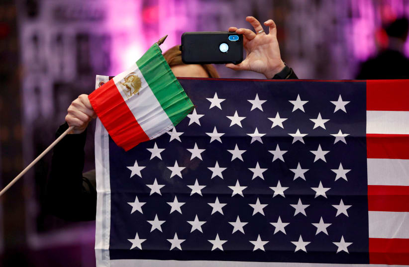 Flags from Iran and the United States  at the California Convention for a Free Iran, Los Angeles, US, January 11, 2020 (photo credit: REUTERS/PATRICK T. FALLON)