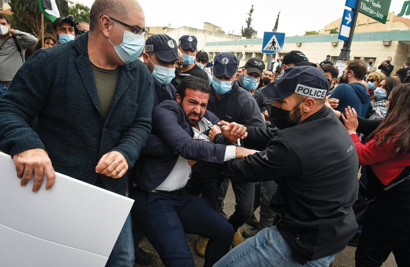 POLICE SCUFFLE with Arab-Israelis in Nazareth during a protest against Prime Minister Benjamin Netanyahu’s visit to the city earlier this month. (photo credit: RONI OFER/FLASH90)