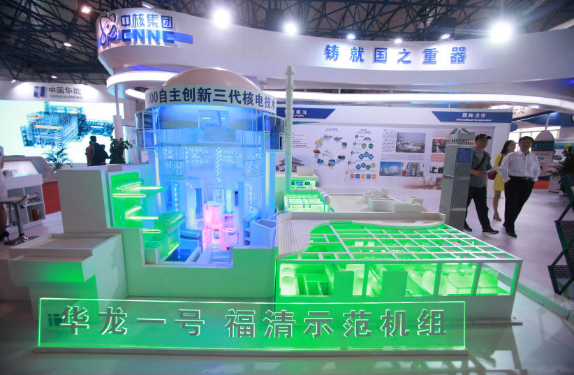 Model of nuclear reactor "Hualong One" is pictured at the booth of CNNC at an expo in Beijing (photo credit: REUTERS/STRINGER)