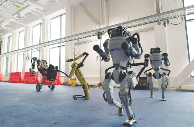 ROBOTS DANCE in a Boston Dynamics robotics company video posted on December 29. (photo credit: BOSTON DYNAMICS VIA REUTERS)