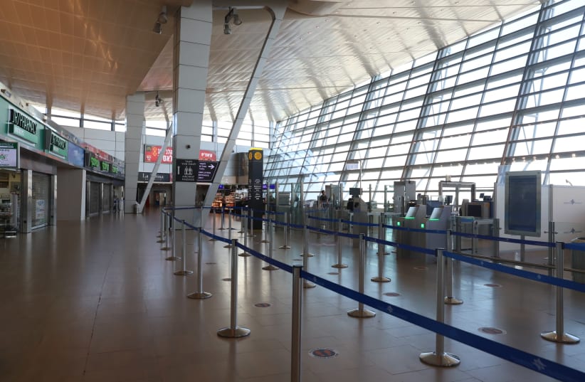 The departure hall at the almost empty Ben Gurion International Airport near Tel Aviv on January 25, 2021.  (photo credit: YOSSI ALONI/FLASH90)
