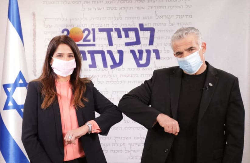 Merav Ben-Ari with Yesh Atid leader Yair Lapid, February 1, 2021 (photo credit: RAANAN COHEN)
