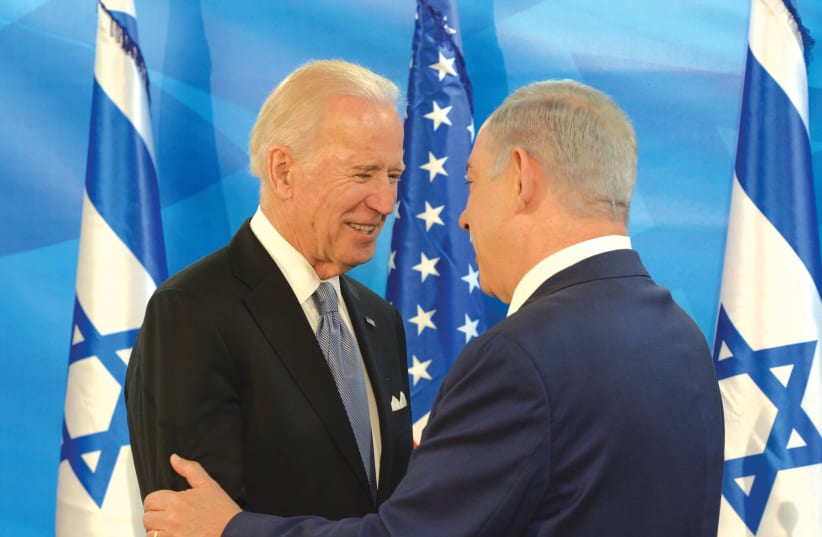 PRIME MINISTER Benjamin Netanyahu meets with then-US vice president Joe Biden in Jerusalem, in March 2016, There is ‘history’ between these two leaders that needs to be dealt with. (photo credit: AMOS BEN-GERSHOM/GPO)