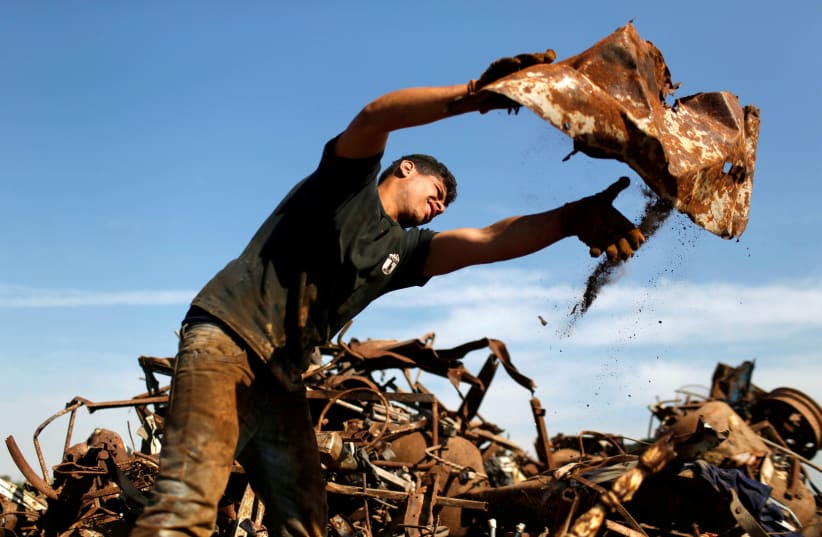 Gaza wasted scrap metals gains value as Israel clears exports (photo credit: MOHAMMED SALEM/ REUTERS)