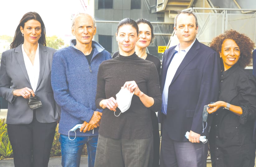 LABOR PARTY leader Merav Michaeli (center) attends a first meeting of the party with its newly-elected members, in Tel Aviv on Tuesday. (photo credit: AVSHALOM SASSONI/FLASH90)