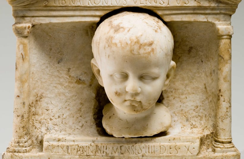 Marble funerary shrine with the four-year old child Tiberius Natronius Venustus.  (photo credit: VATICAN MUSEUM)