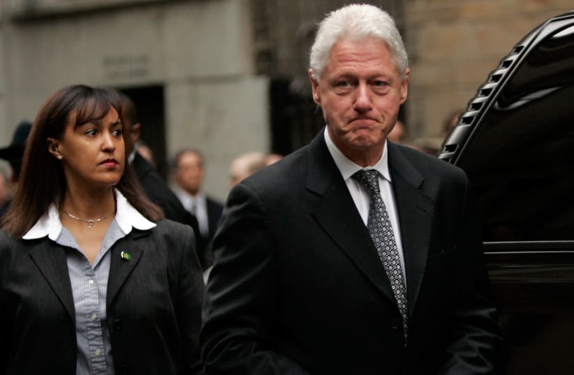 FORMER US president Bill Clinton leaves a memorial service for the wife of Charles Bronfman in New York in 2006. Bronfman has been a major donor for Birthright Israel and Jewish organizations.  (photo credit: REUTERS/KEITH BEDFORD)