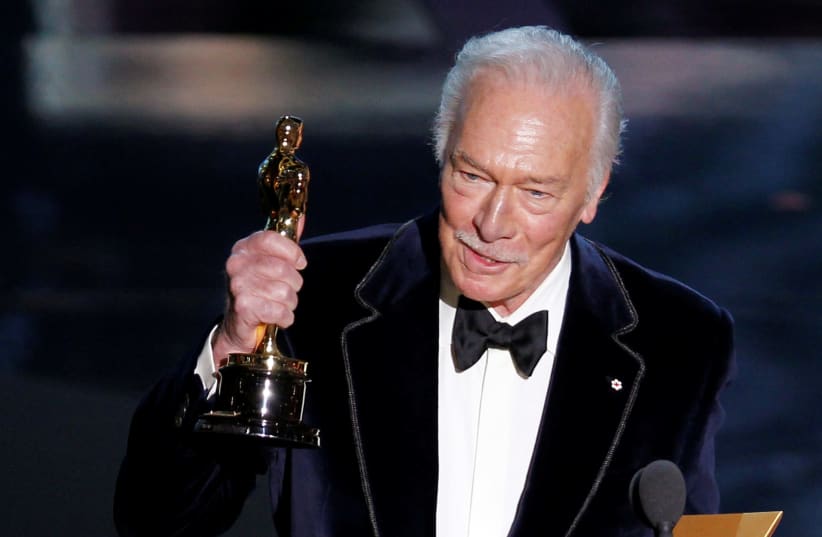 Christopher Plummer, accepts the Oscar for best supporting actor for his role in "Beginners" at the 84th Academy Awards in Hollywood, California, February 26, 2012.  (photo credit: GARY HERSHORN/REUTERS)