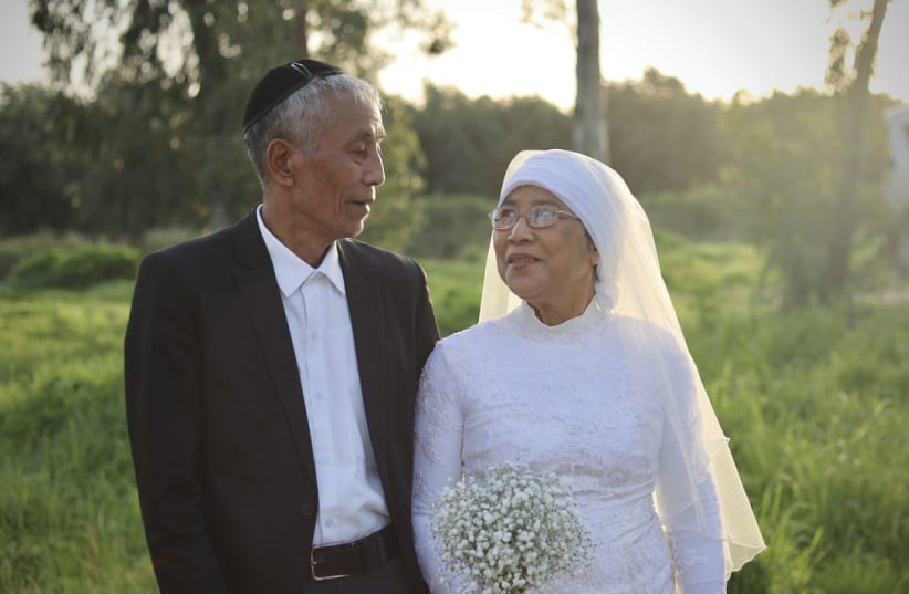 MACCABI HNAMTE (72) and his wife, Sarah (70), were among the Bnei Menashe couples who remarried recently at Shavei Israel’s immigrant absorption center in Nordia. (photo credit: LAURA BEN-DAVID/SHAVEI ISRAEL)