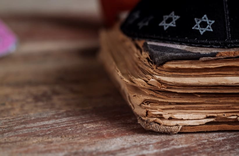 A kippah and a pile of documents.  (photo credit: GETTY IMAGES/JTA)
