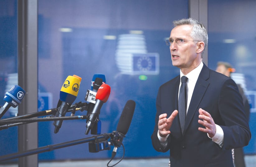 NATO SECRETARY-GENERAL Jens Stoltenberg holds a news conference to discuss ways to try to save the Iran nuclear deal, in Brussels, Belgium, last month. (photo credit: JOHANNA GERON/REUTERS)