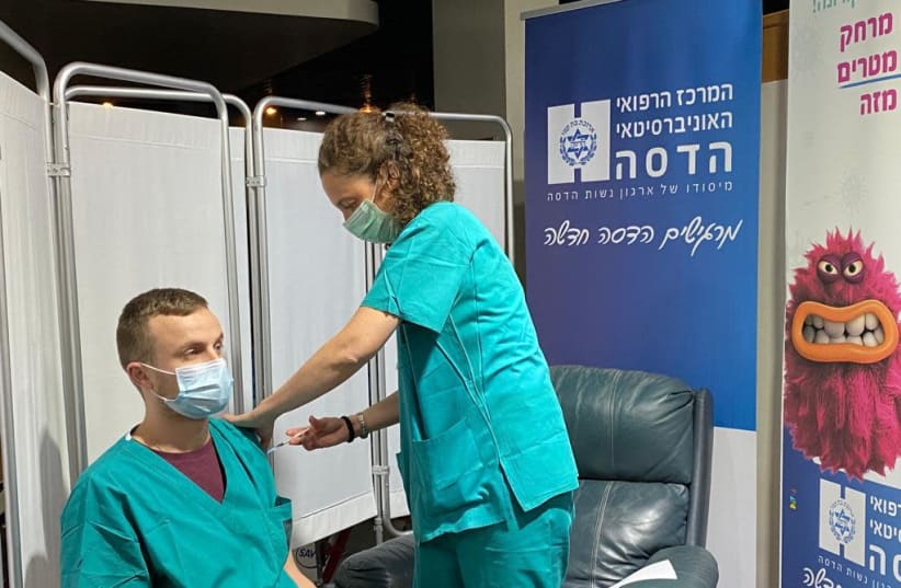 Medical personnel at Hadassah-University Medical Center is inoculated (photo credit: HADASSAH SPOKESPERSON)
