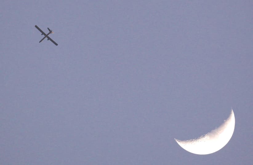AN ISRAELI drone patrols the skies over the Gaza Strip. (photo credit: DARREN WHITESIDE / REUTERS)