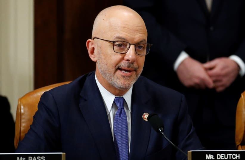 Rep. Ted Deutch, D-Fla., votes to approve the second article of impeachment against President Donald Trump during a House Judiciary Committee meeting on Capitol Hill, in Washington. (photo credit: PATRICK SEMANSKY/POOL VIA REUTERS)