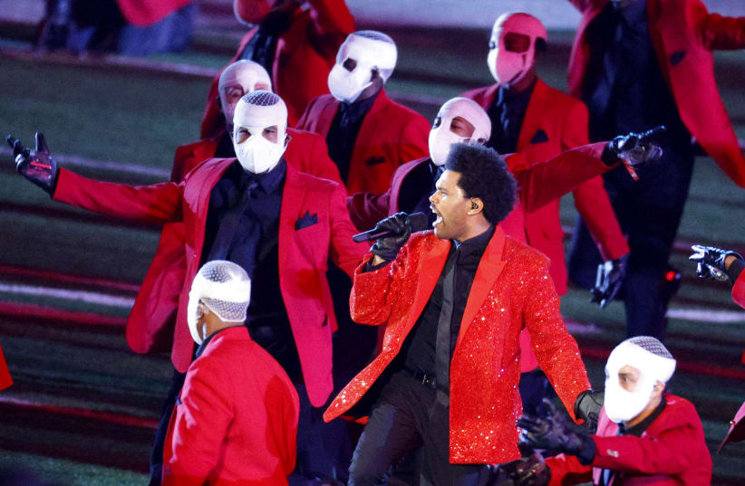 The Weeknd performs during the halftime show (photo credit: REUTERS)