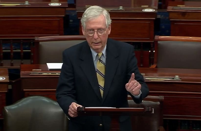 US Senate Minority Leader Mitch McConnell (R-KY) speaks about former US president Donald Trump, accusing him of dereliction of duty, immediately after the US Senate voted to acquit Trump by a vote of 57 guilty to 43 not guilty, short of the 2/3s majority needed to convict, during the fifth day of th (photo credit: US SENATE TV/HANDOUT VIA REUTERS)
