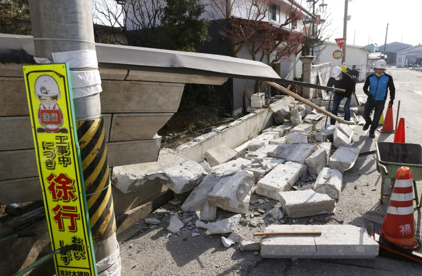 A collapsed wall by a strong earthquake is pictured in Kunimi, Fukushima Prefecture, Japan on February 14, 2021 in this photo taken by Kyodo. (photo credit: KYODO/VIA REUTERS)