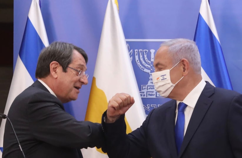 Cypriot President Nicos Anastasiades (R) with Prime Minister Benjamin Netanyahu (R)  (photo credit: MARC ISRAEL SELLEM)