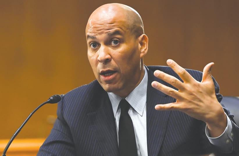 US Senator Cory Booker (D-NJ) speaks during a Senate Environment and Public Works Committee hearing on Capitol Hill in Washington earlier this month. (photo credit: BRANDON BELL/REUTERS/POOL)