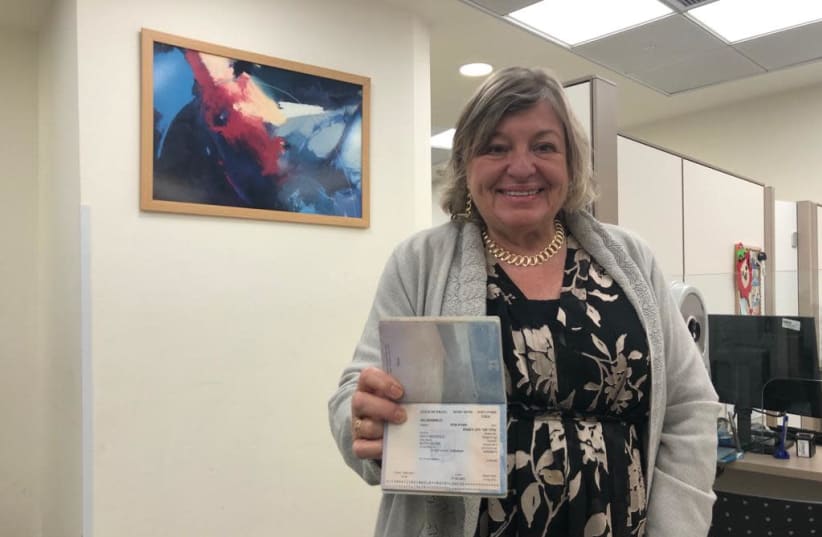 Prof. Ruth Katz shows off her brand new Israeli citizen ID having obtained it on Wednesday after a two year struggle with the Interior Ministry. (photo credit: COURTESY PROF. RUTH KATZ)