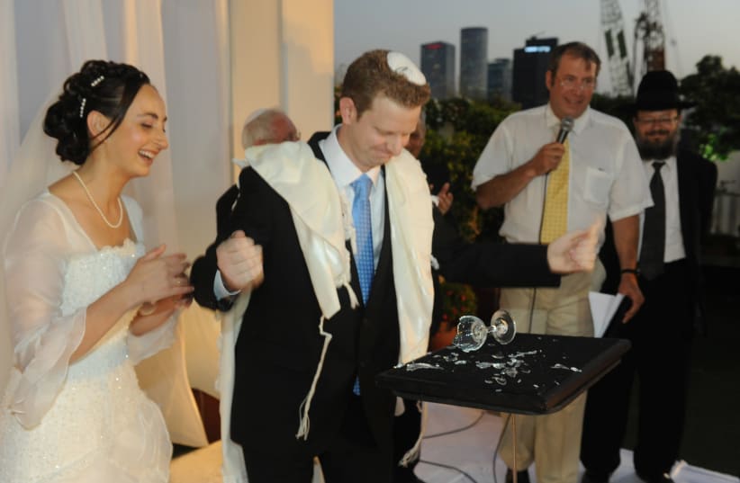 ASSAF SALOMON: Breaking the glass at his wedding with the power of his mind (photo credit: URIEL BAREL)