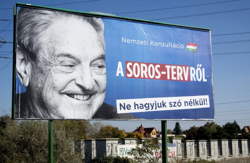 This 2017 billboard in Budapest was part of a Hungarian government campaign to “demonize George Soros,” the report said. (photo credit: ATTILA KISBENEDEK / AFP)