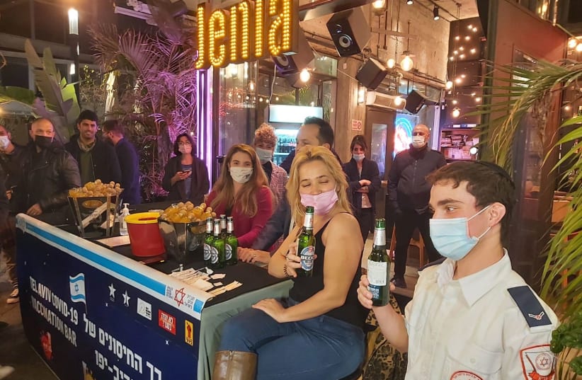 For The First Time In Israel – Vaccinations At A Bar in Tel Aviv (photo credit: KFIR SIVAN)