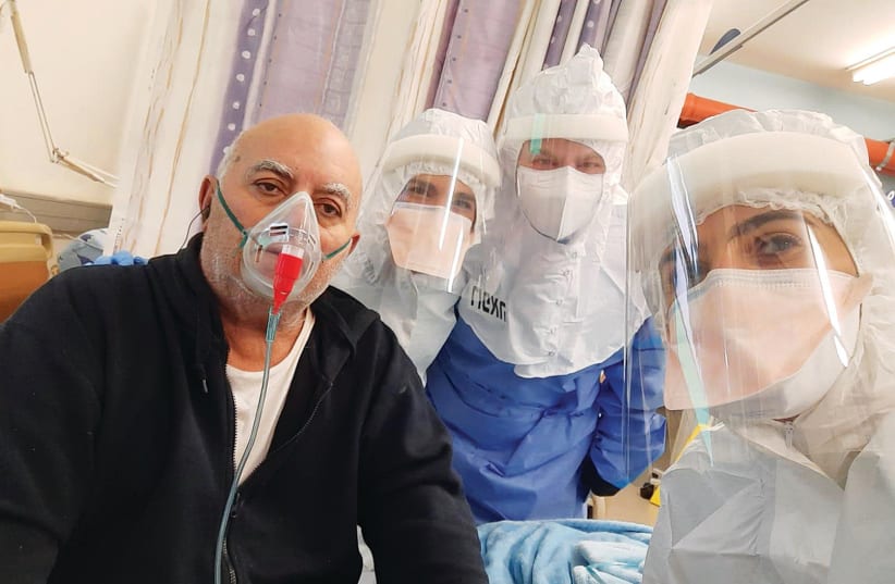 A PATIENT is administered Prof. Nadir Arber’s EXO-CD24 COVID-19 treatment. (photo credit: ICHILOV SPOKESPERSON'S OFFICE)